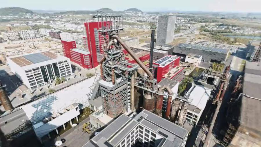 A full-colour 3D reconstruction of the Belval steelworks and the city built around it, flown through from the air